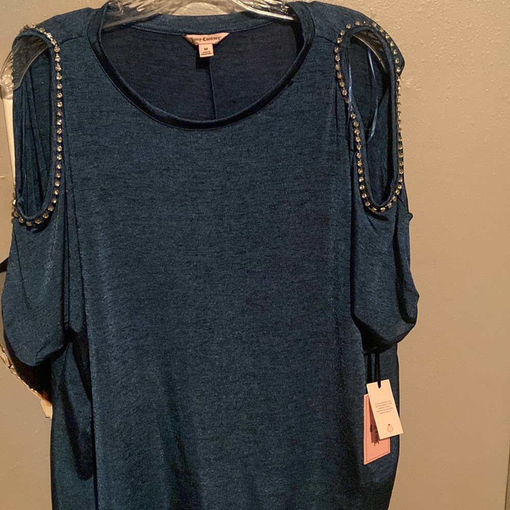 Juicy Couture size medium , open shoulder , shirt .